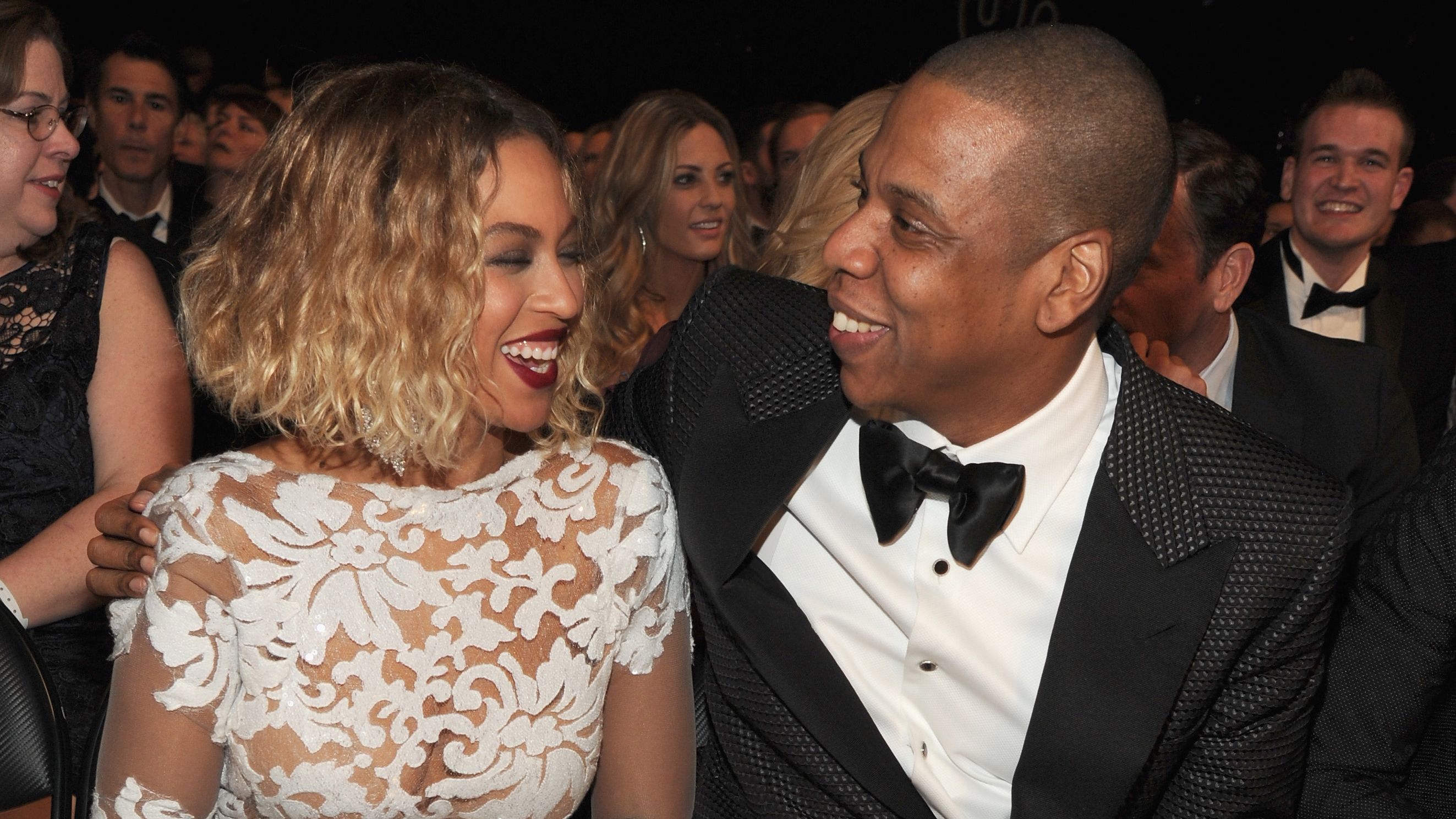 LOS ANGELES, CA - JANUARY 26: Singer Beyonce (L) and rapper Jay-Z attend the 56th GRAMMY Awards at Staples Center on January 26, 2014 in Los Angeles, California. (Photo by Kevin Mazur/WireImage)